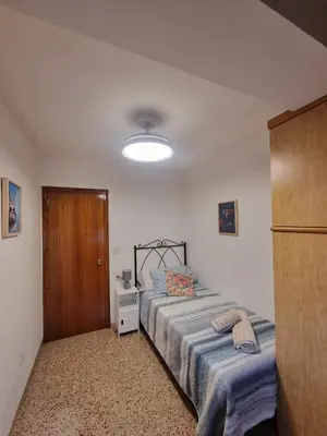 Cama o camas de una habitación en Amani Apartamento Alcañiz