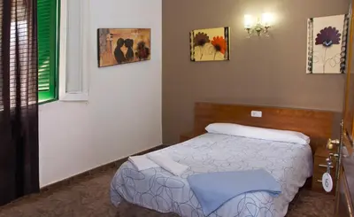 Cama o camas de una habitación en Hernani Bardenas