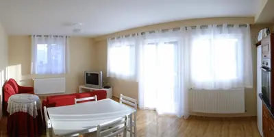 Una televisión o centro de entretenimiento en Apartamentos Eneriz
