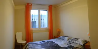 Cama o camas de una habitación en Apartamentos Eneriz