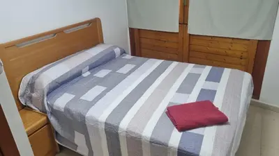 Cama o camas de una habitación en Apartamento Torre Gótica