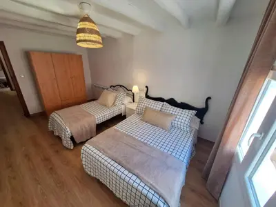 Cama o camas de una habitación en Casa Rural Teresa