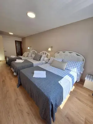 Cama o camas de una habitación en Casa Rural Teresa