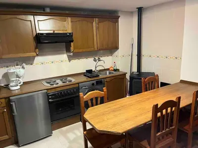 Una cocina o zona de cocina en Coqueto apartamento en Jaca