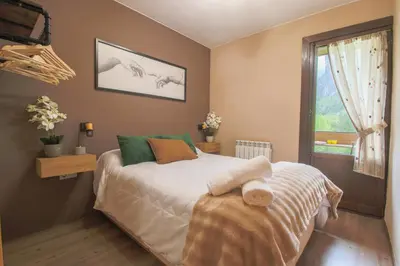 Cama o camas de una habitación en Suite Vistas Únicas a Ordesa y MontePerdido - Piscinas - Barbacoa