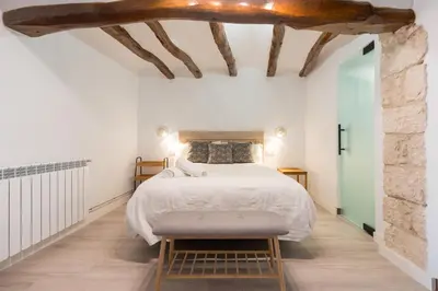 Cama o camas de una habitación en Casa Rural Encantadora