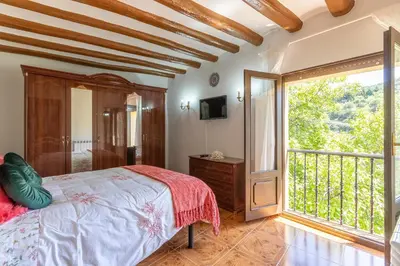 Cama o camas de una habitación en El Balcón de Préjano