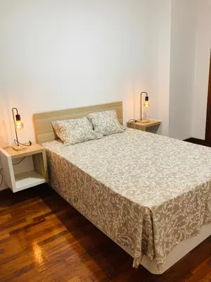 Cama o camas de una habitación en Apartamento El Olmo - casco histórico de Zaragoza
