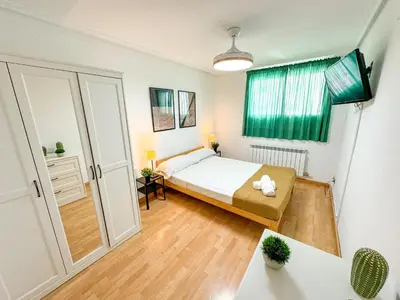 Cama o camas de una habitación en El Angel del Pilar Turistea