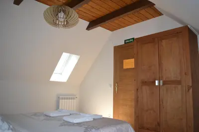 Cama o camas de una habitación en Alojamientos Rurales Apezarena