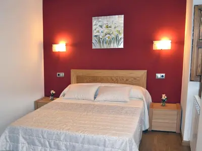 Cama o camas de una habitación en Alojamientos Rurales Apezarena