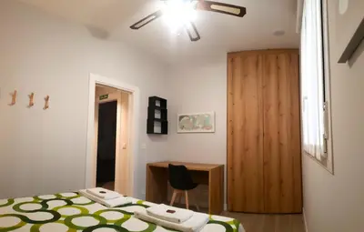 Cama o camas de una habitación en Apartamentos Meson del Barro - Alojamientos Pamplona