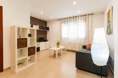 Una televisión o centro de entretenimiento en Apartamento Confort Valderrobres