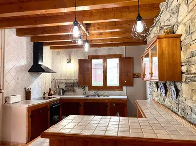 Una cocina o zona de cocina en Casa Martinach - L'Amfitriona