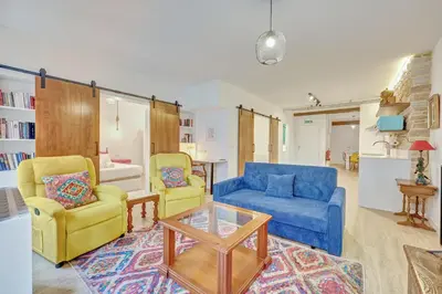 Zona de estar de Apartamento Balcón del Arte by Clabao