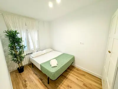 Cama o camas de una habitación en El Mastin del Pirineo Turistea