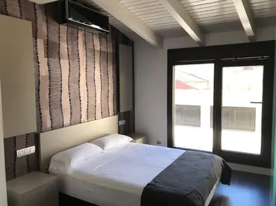 Cama o camas de una habitación en 06 - Apartamentos Zentrum - Casco Histórico - Duplex
