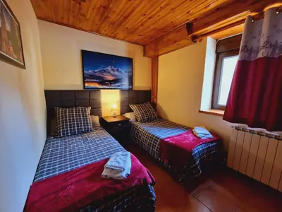 Cama o camas de una habitación en ERA CABANA de Apartamentos Rufaste