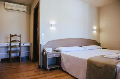 Cama o camas de una habitación en Hotel&Bar Ducay
