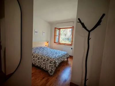 Cama o camas de una habitación en Chimenea y modernidad rústica- Confort ideal - Dellui 3