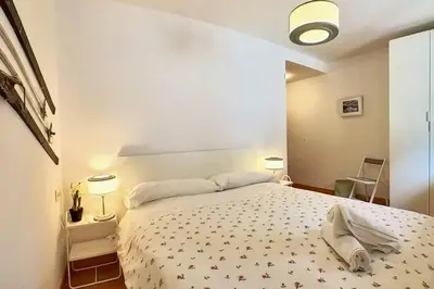 Cama o camas de una habitación en Pondiellos 42 - tucasaenlospirineos