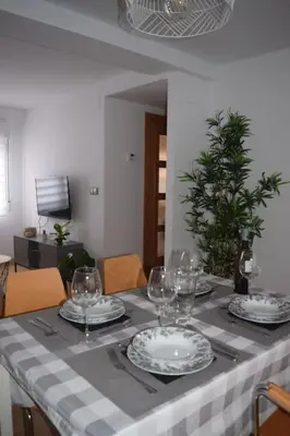 Una televisión o centro de entretenimiento en Inmejorable Apartamento cerca Estación Delicias con GARAJE