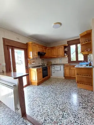 Una cocina o zona de cocina en Casa El Abeto