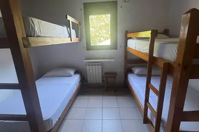 Cama o camas de una habitación en Albergue La Escuela de Liri