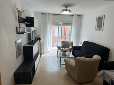Una televisión o centro de entretenimiento en Apartamentos L'Ainsa