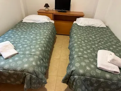 Cama o camas de una habitación en Apartamentos L'Ainsa