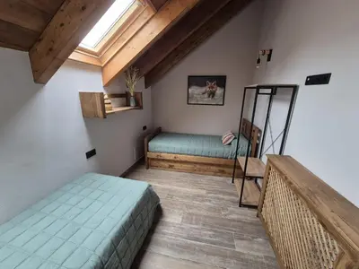 Cama o camas de una habitación en Alojamientos Ruraltena