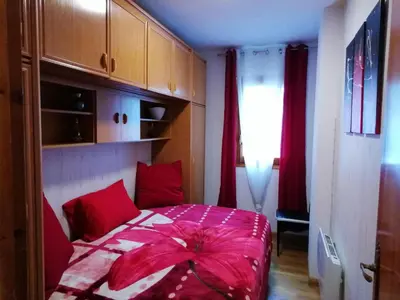 Cama o camas de una habitación en JACA Bien venue chez mimi