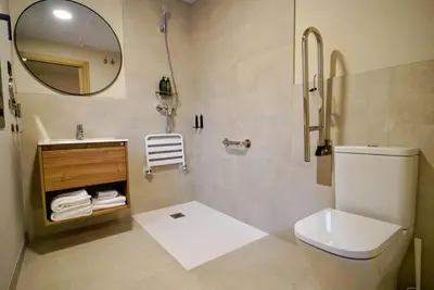 Un baño de Hotel Casa Peix