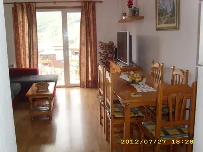 Una televisión o centro de entretenimiento en FORMIGAL Edificio PORTALET II VUT-HU-25-0303