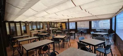 Un restaurante o sitio para comer en Vineam Hotel