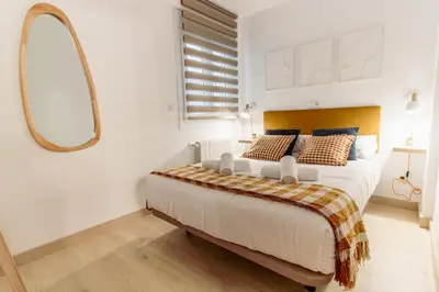 Cama o camas de una habitación en Modern Comfort in the Heart of Zaragoza