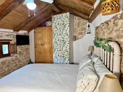 Cama o camas de una habitación en El RINCÓN DE LAS PARRAS