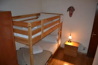 Cama o camas de una habitación en Arafita, cálido y familiar - Arafita Apartamentos