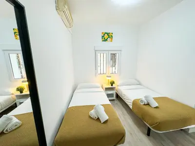 Cama o camas de una habitación en Madrina del Pilar - Turistea