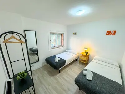 Cama o camas de una habitación en Madrina del Pilar - Turistea