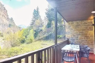 Un balcón o terraza de Mimosa 5 con terraza - tucasaenlospirineos