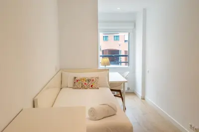 Cama o camas de una habitación en Clínica Universitaria y Hospitales by Clabao
