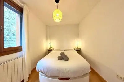 Cama o camas de una habitación en Pondiellos 43 - tucasaenlospirineos