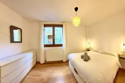 Cama o camas de una habitación en Pondiellos 43 - tucasaenlospirineos