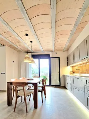 Una cocina o zona de cocina en Casa Rural Cal Roseto con jacuzzi