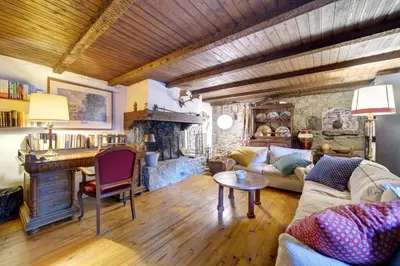 Zona de estar de Chalet Aranés Santa María cerca de Baqueira-Beret by Eth Flòc