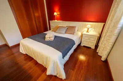 Cama o camas de una habitación en Apartament Vega - Vall Fosca - L'Amfitriona