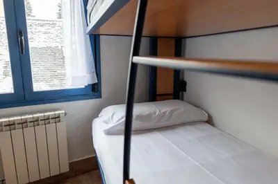 Cama o camas de una habitación en Hostal Nau Pradets