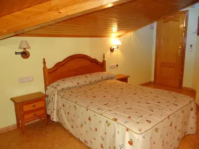 Cama o camas de una habitación en Hotel Casa Carmen