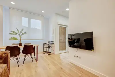 Una televisión o centro de entretenimiento en Apartamento M&A By Clabao